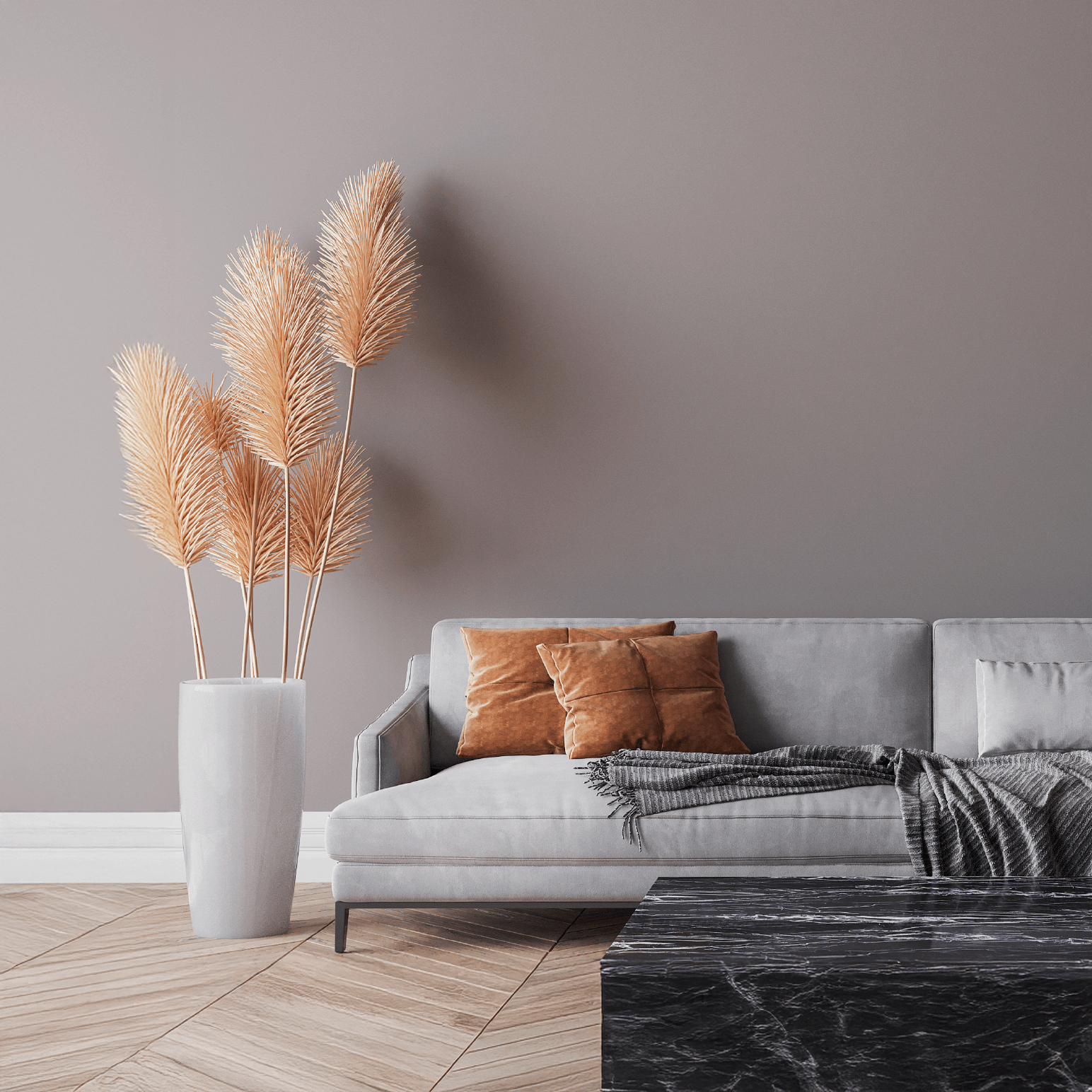 Peinture murale gris chaud n° 730 Design Collection présentée dans un salon moderne avec canapé et décoration.